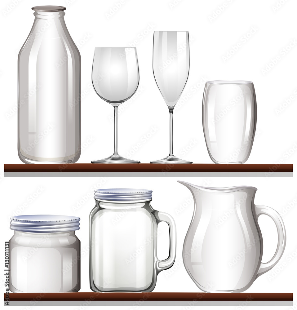 Glasses and bottles on wooden shelves