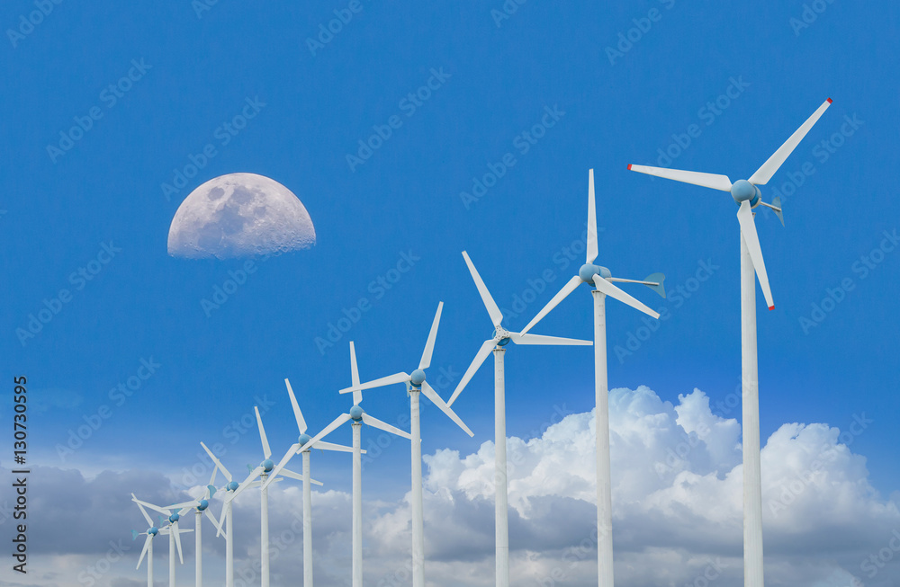 Wind Turbine for alternative energy on background of blue sky with clouds and moon. Eco power concep