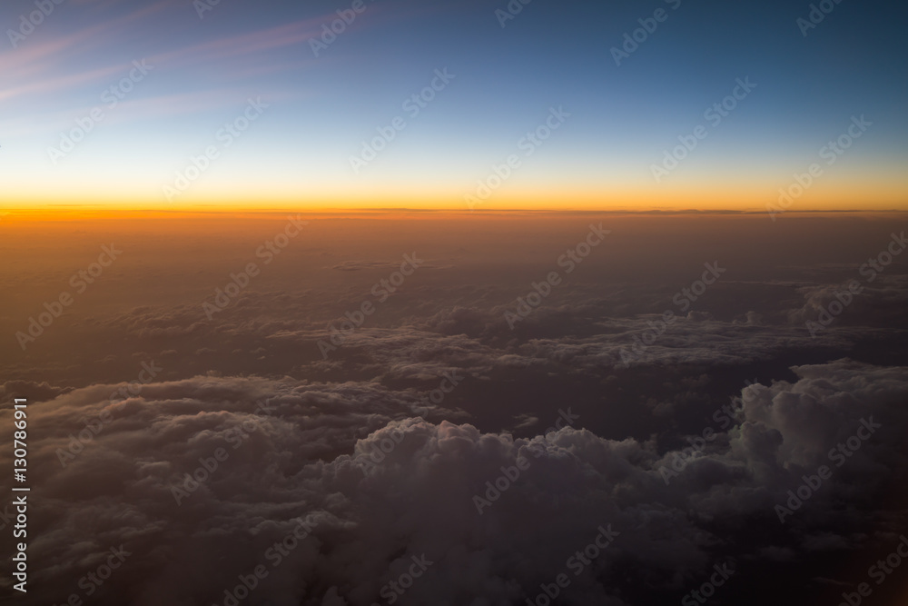 Sunset or sunrise viewed from airplane