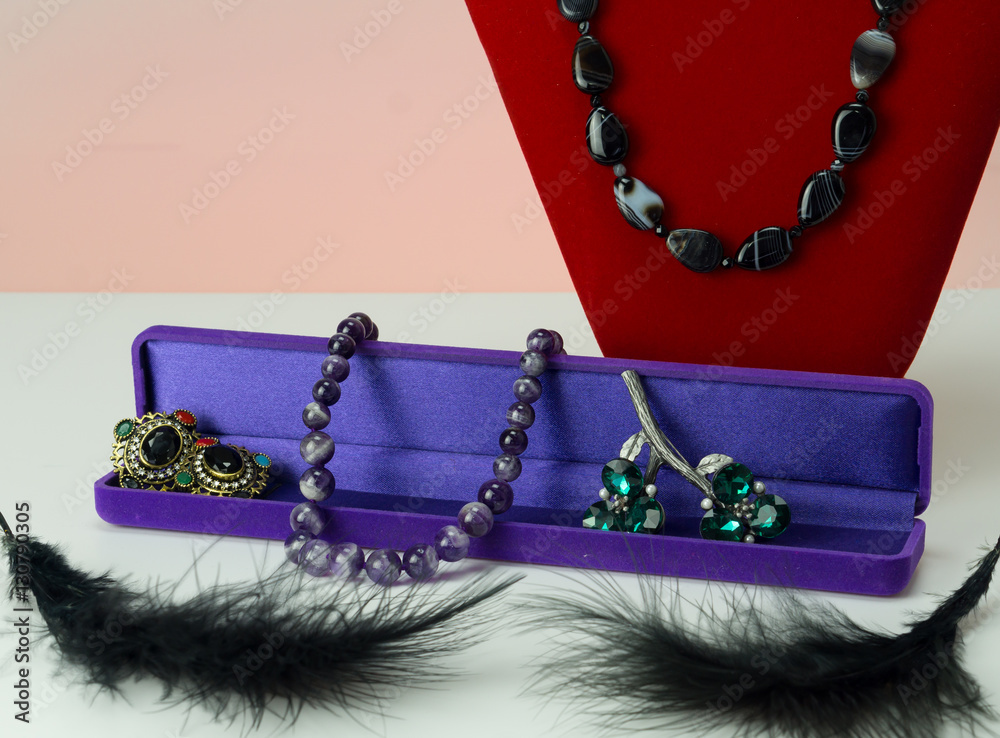 Fashion jewelry and different beads composition. Amethyst, pearl, coral, agate, etc.