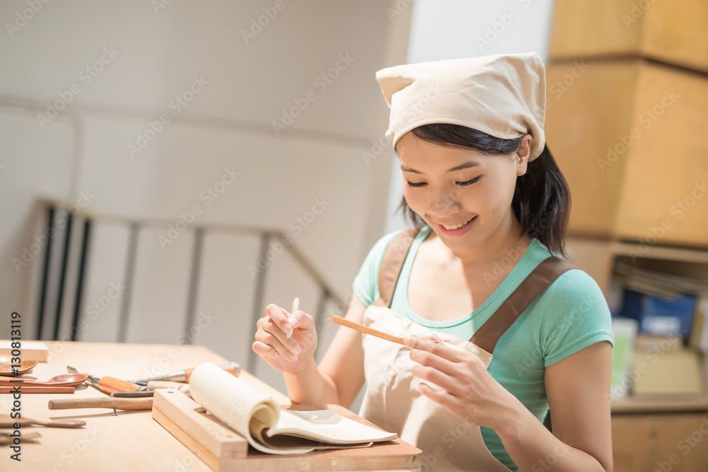 woman woodworking smile happily