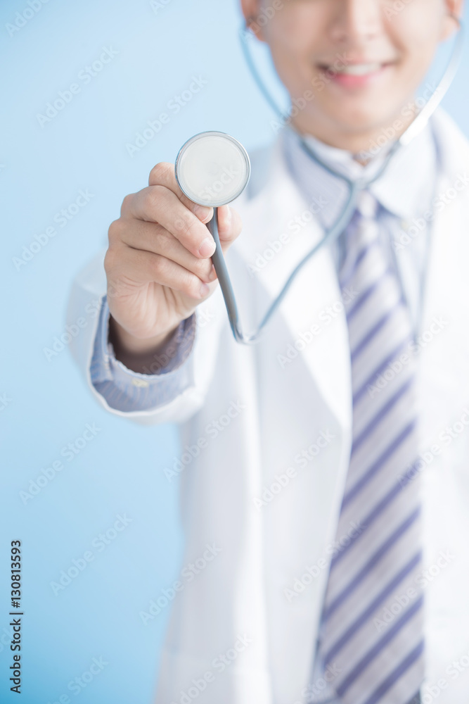 male doctor show stethoscope