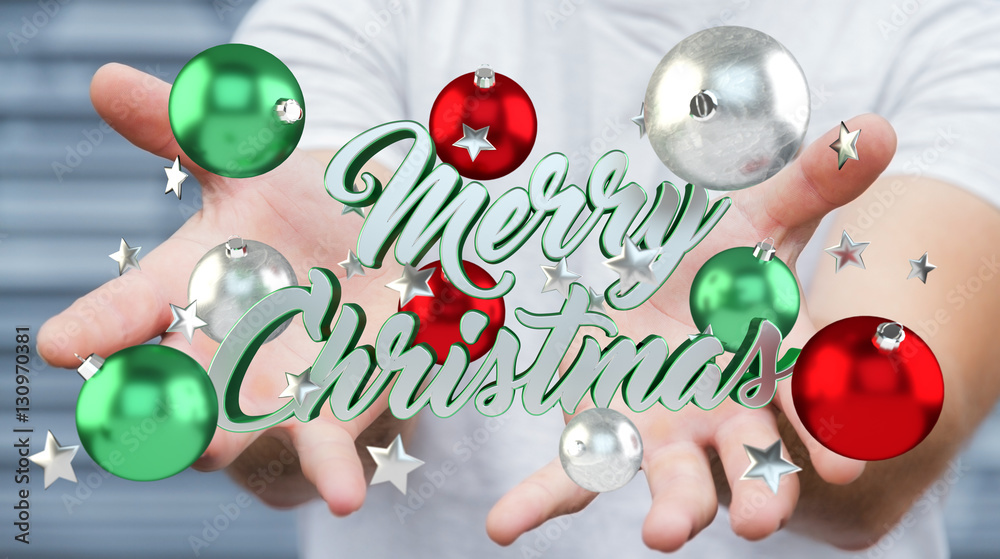 Businessman holding floating christmas message in his hand 3D re