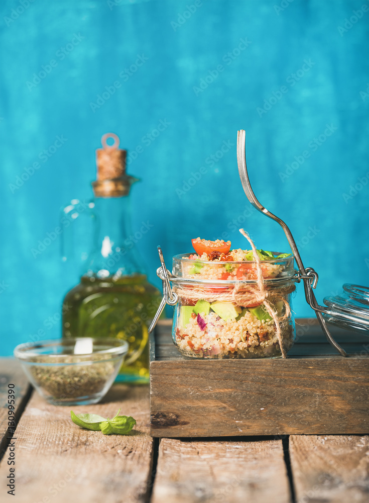 Healthy homemade jar quinoa salad with sun-dried tomatoes, avocado and fresh basil. Detox, dieting, 