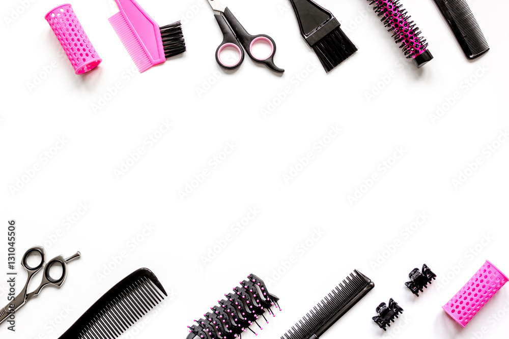 Tools for hair styling on white background top view