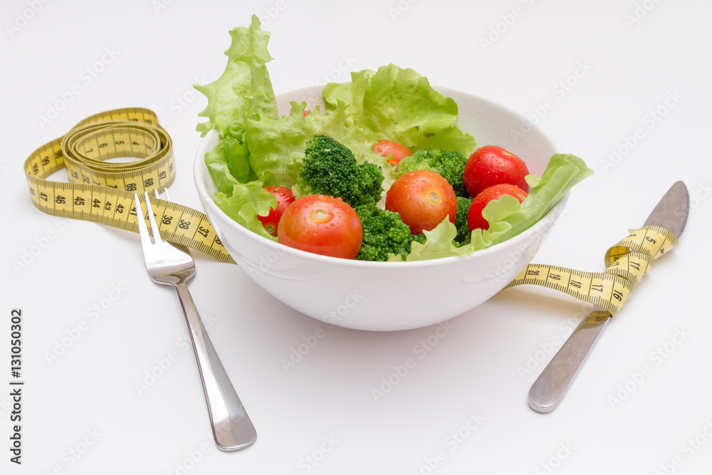 concept diet fresh vegetables on plate at white background