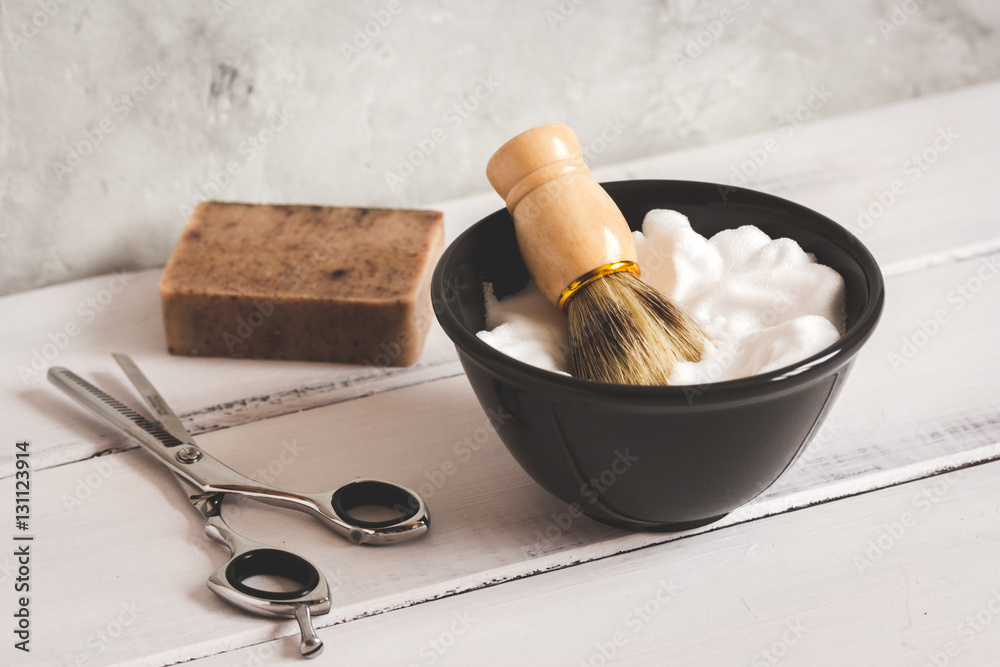 Wooden desktop with tools for shaving beards