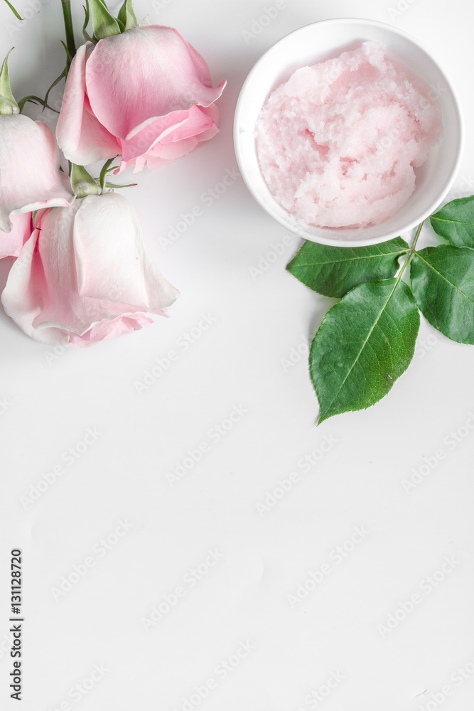 organic cosmetic with rose oil on white background top view