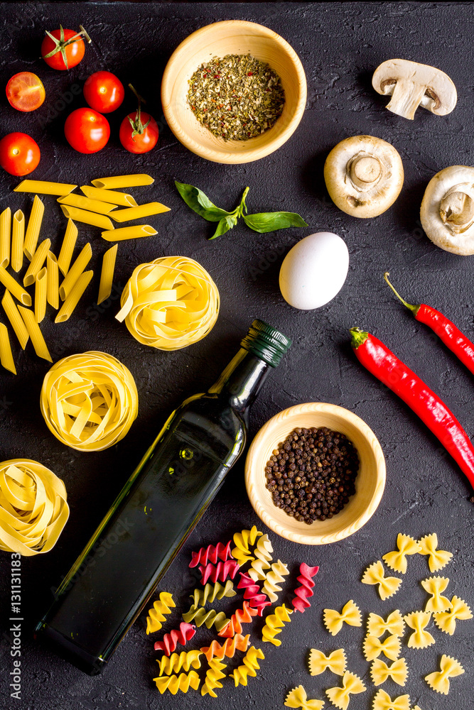 ingredients for cooking paste on dark background top view