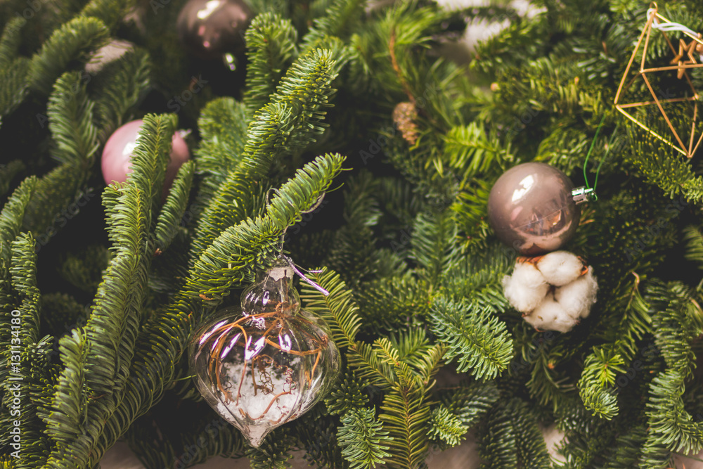 fir branches with ornaments in florist shop