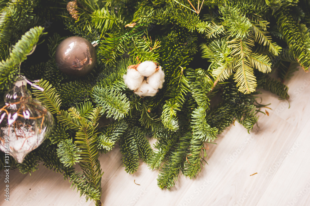 fir branches with ornaments in florist shop