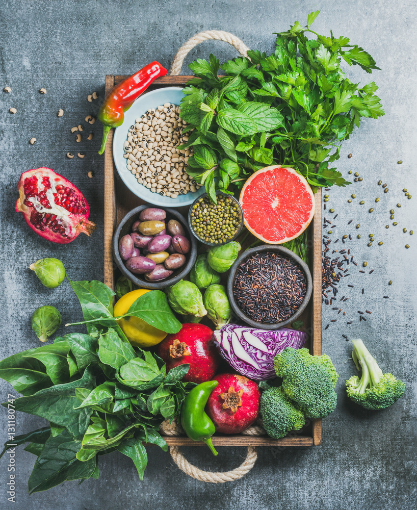 Vegetables, fruit, seeds, cereals, beans, spices, superfoods, herbs, condiment in wooden box for veg