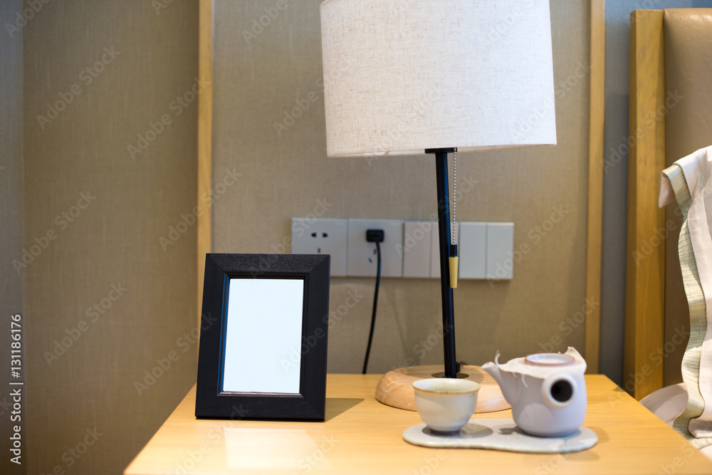 night table with frame in modern bedroom