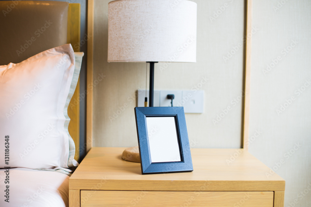 night table with frame in modern bedroom