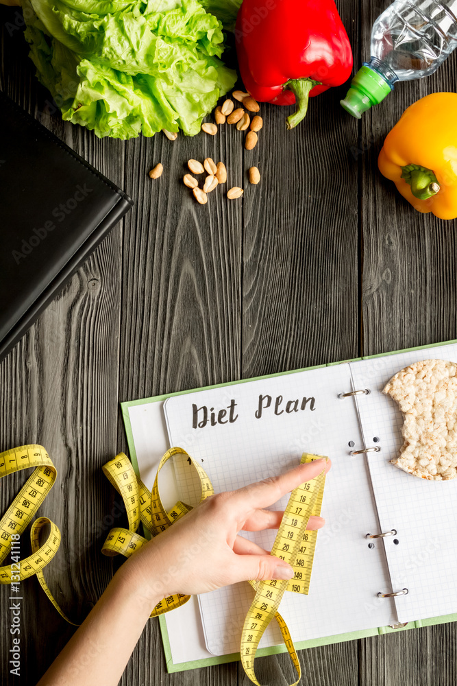 concept diet, slimming plan with vegetables top view mock up