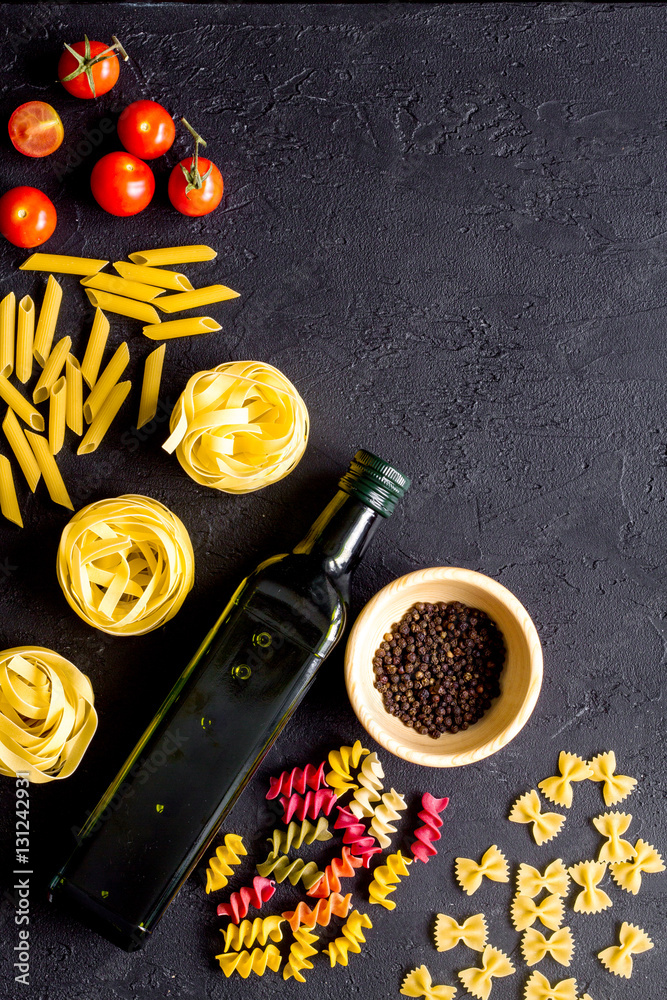 ingredients for cooking paste on dark background top view