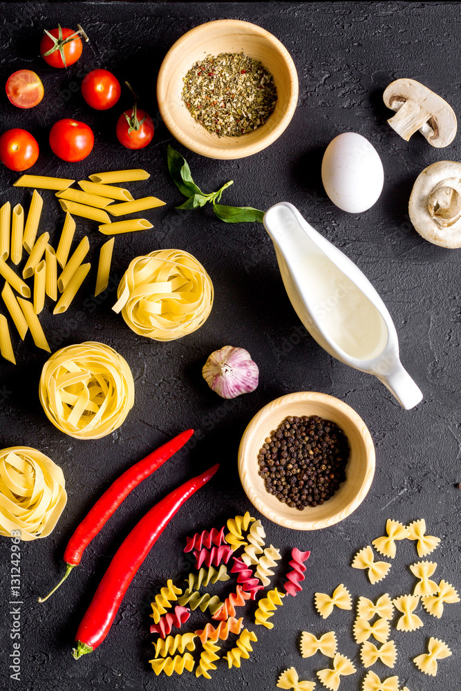 ingredients for cooking paste on dark background top view