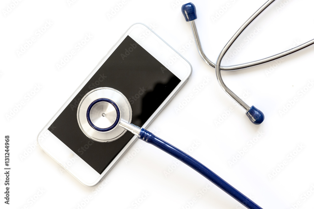 diagnostic of gadgets on white background with stethoscope