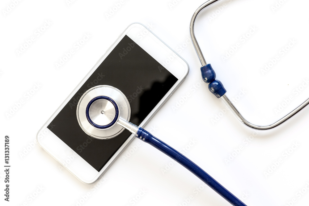 diagnostic of gadgets on white background with stethoscope