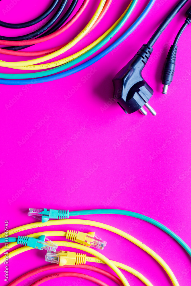 concept network internet cable on pink background close up