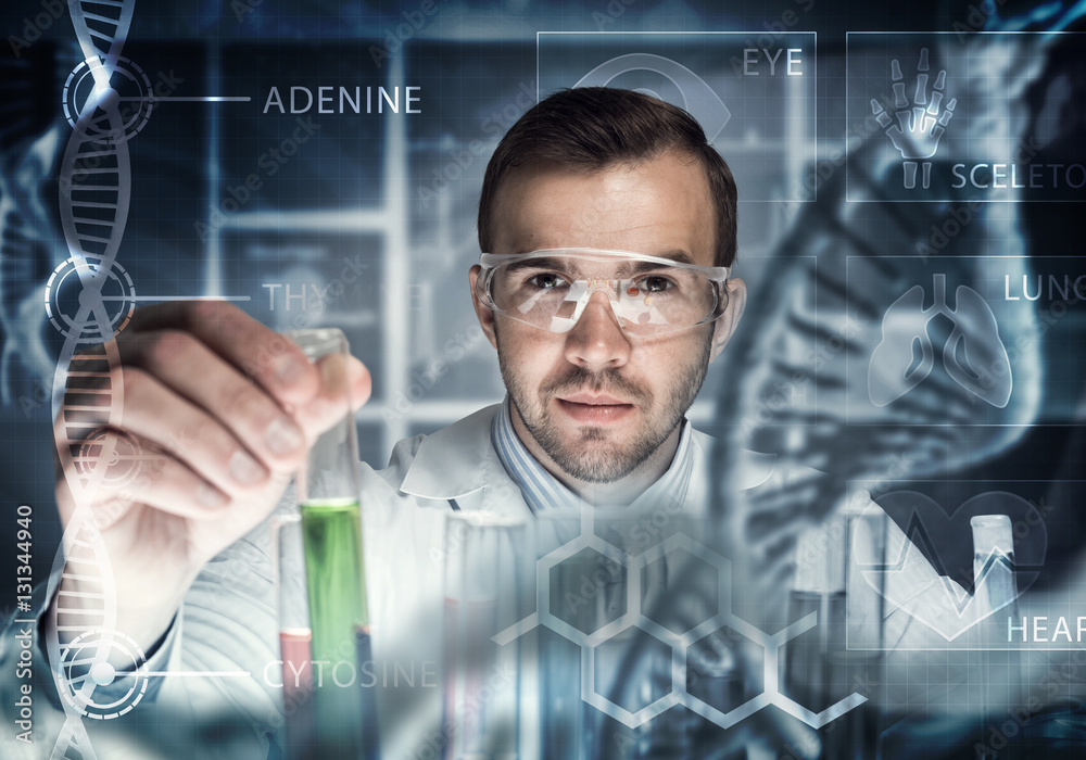 Young scientist mixing reagents in glass flask in clinical laboratory