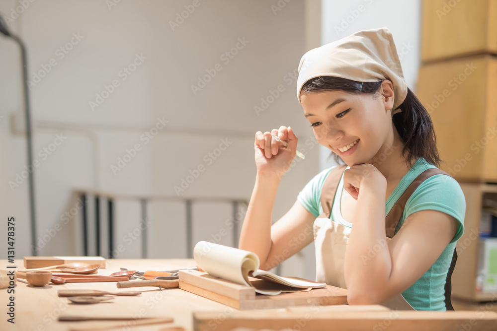 woman woodworking smile happily