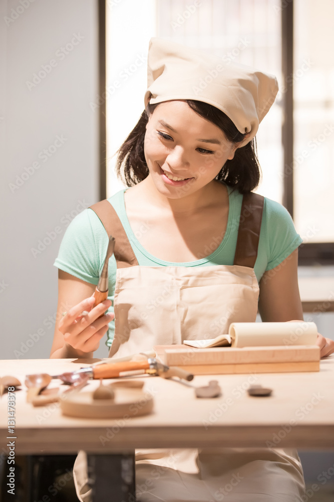 woman woodworking smile happily