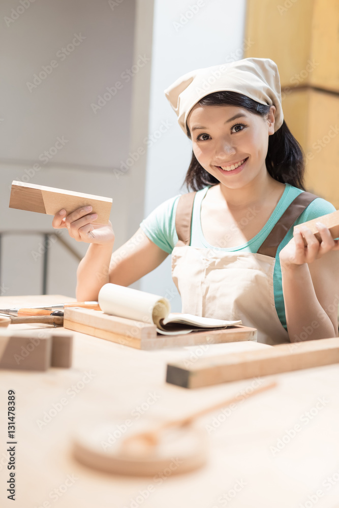 woman woodworking smile happily