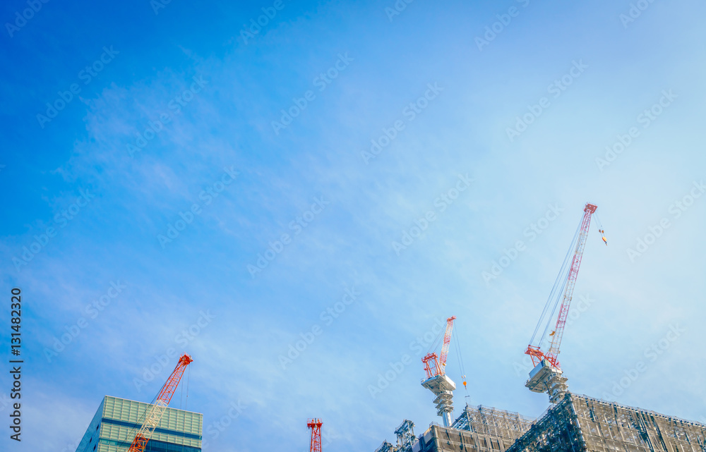 Crane and building construction site