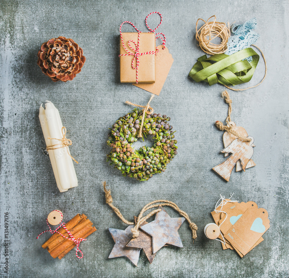 Preparing for Christmas. Christmas related objects on grey concrete table background, top view. Holi