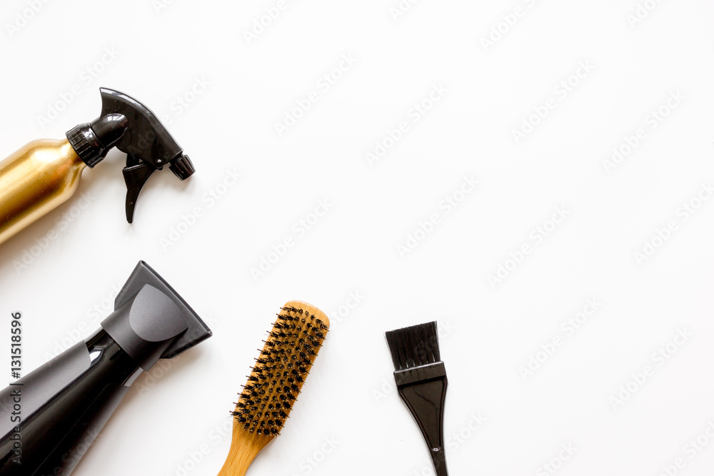 combs and hairdresser tools on white background top view