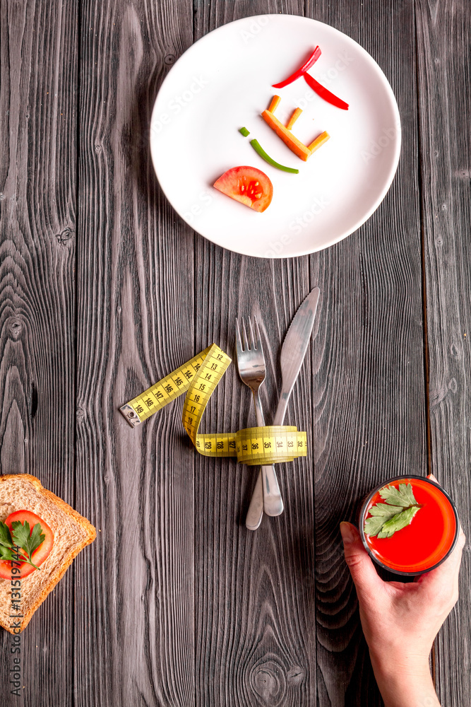 concept slimming diet fresh vegetables on wooden background top view