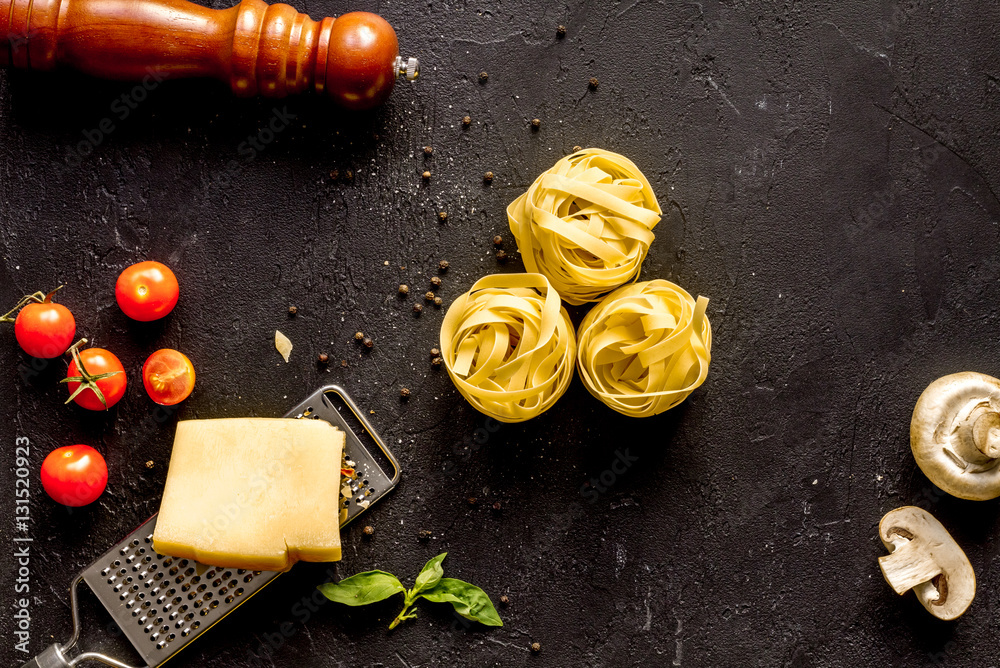 ingredients for cooking paste on dark background top view