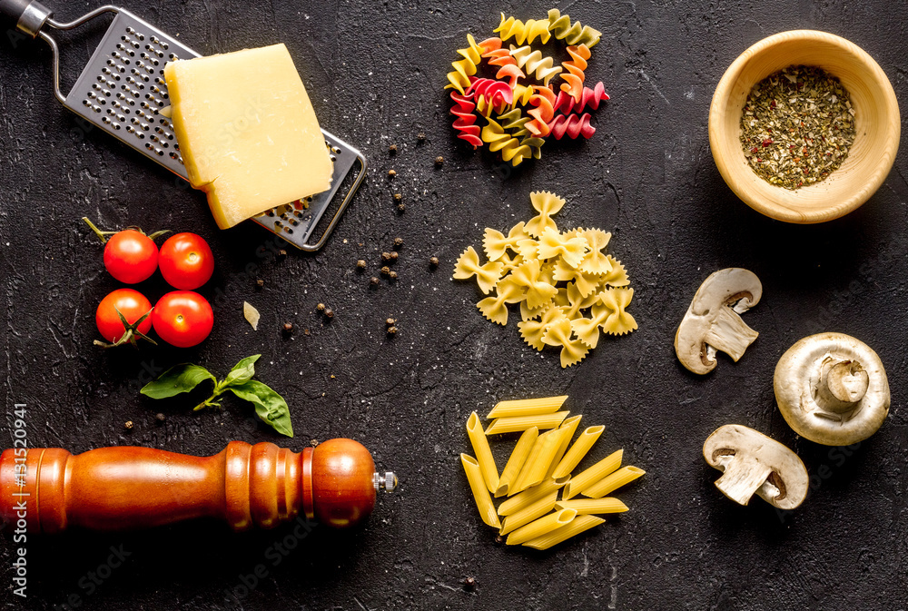 ingredients for cooking paste on dark background top view