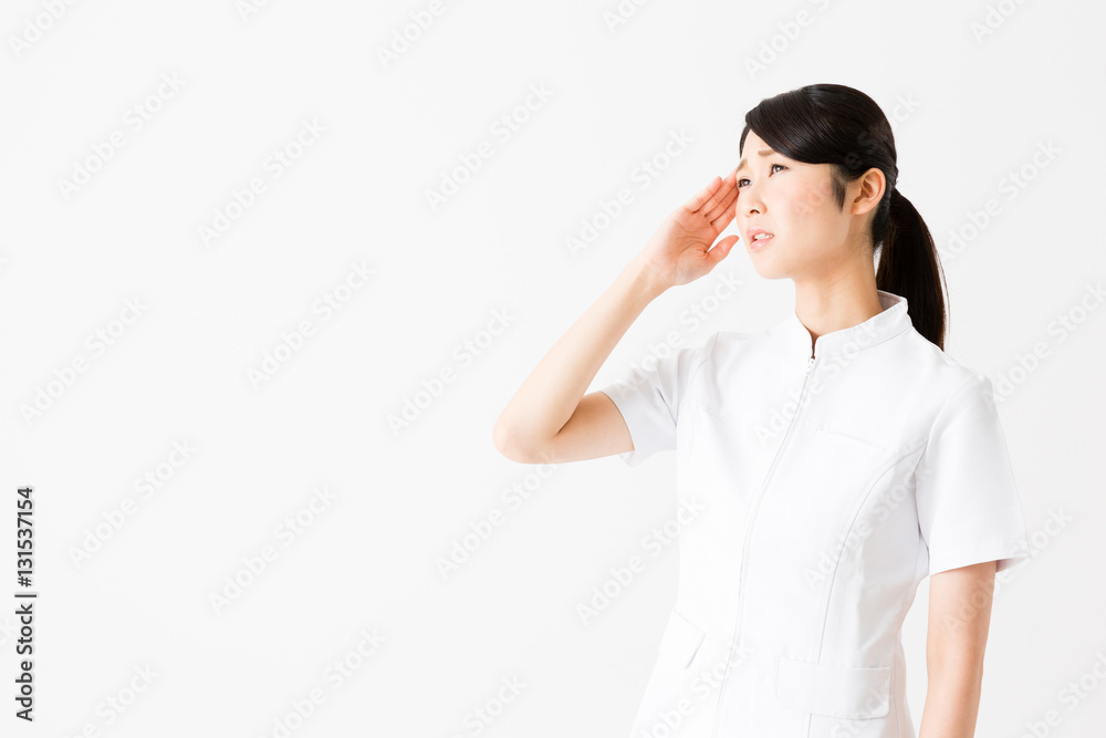 young asian nurse isolated on white background