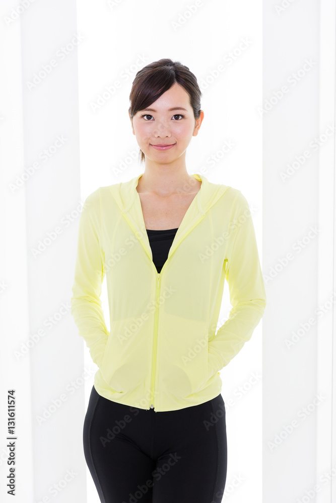 portrait of sporty asian woman relaxing