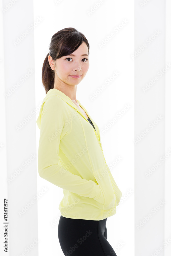 portrait of sporty asian woman relaxing