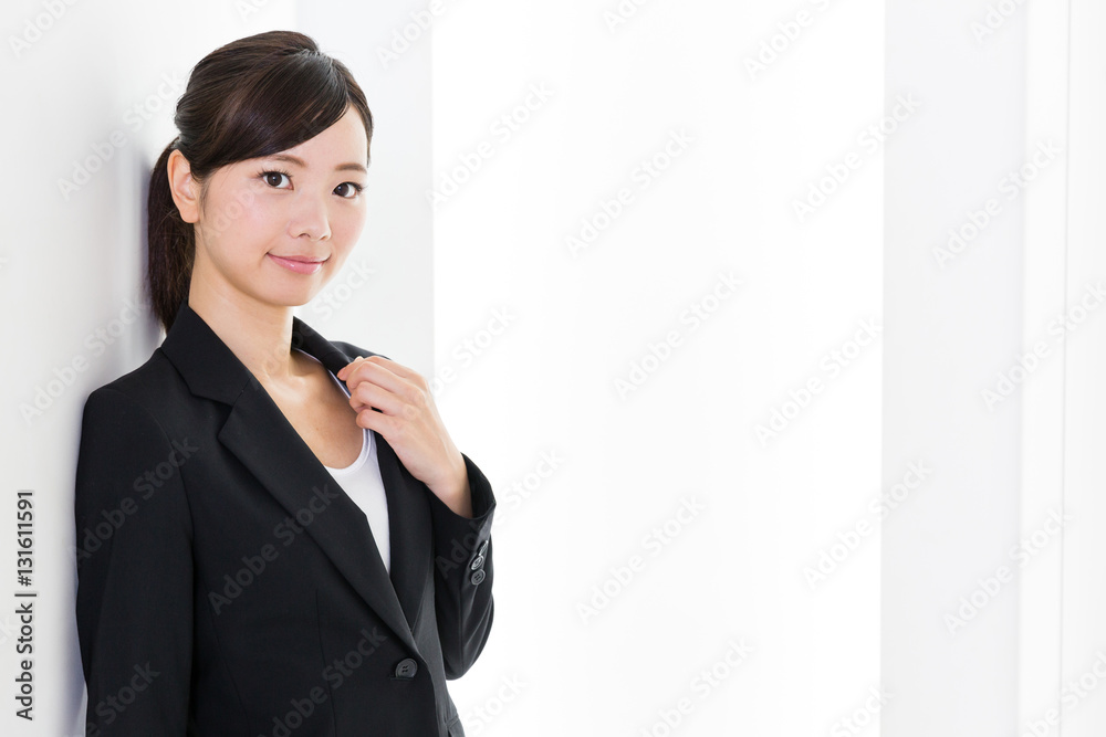 portrait of asian businesswoman relaxing