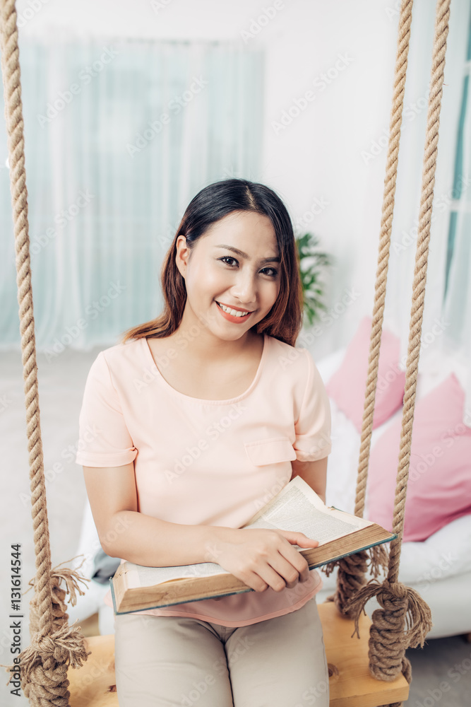 Portrait of young asian woman relaxing at home