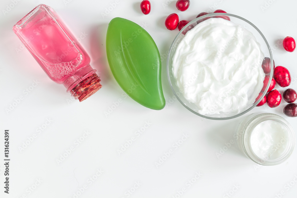 organic cosmetics with extracts of berries white background top view