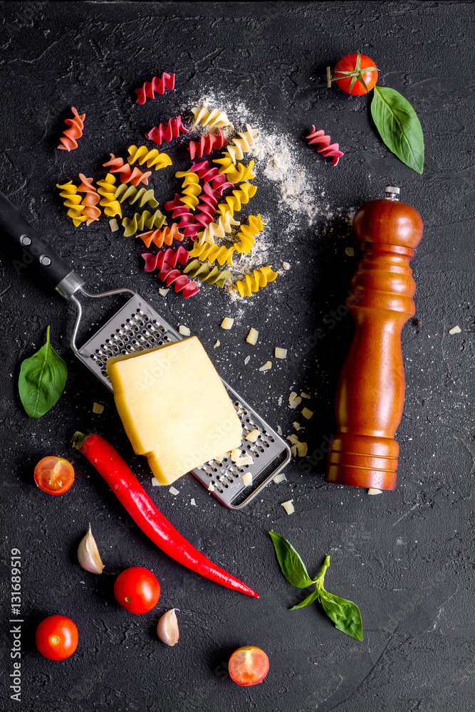 ingredients for cooking paste on dark background top view