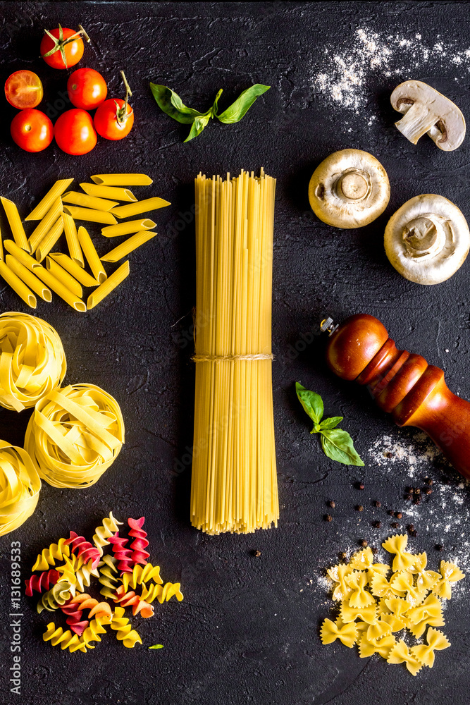 ingredients for cooking paste on dark background top view