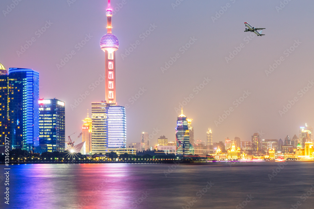 Shanghai skyline and modern cityscape at night,China