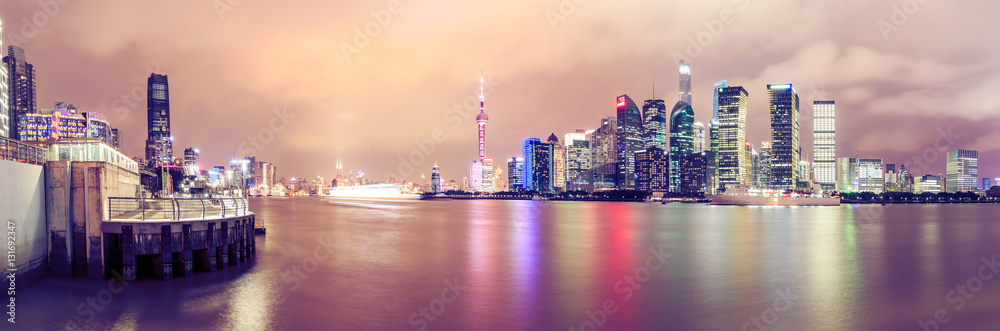 Shanghai skyline and modern cityscape panoramic view at night,China