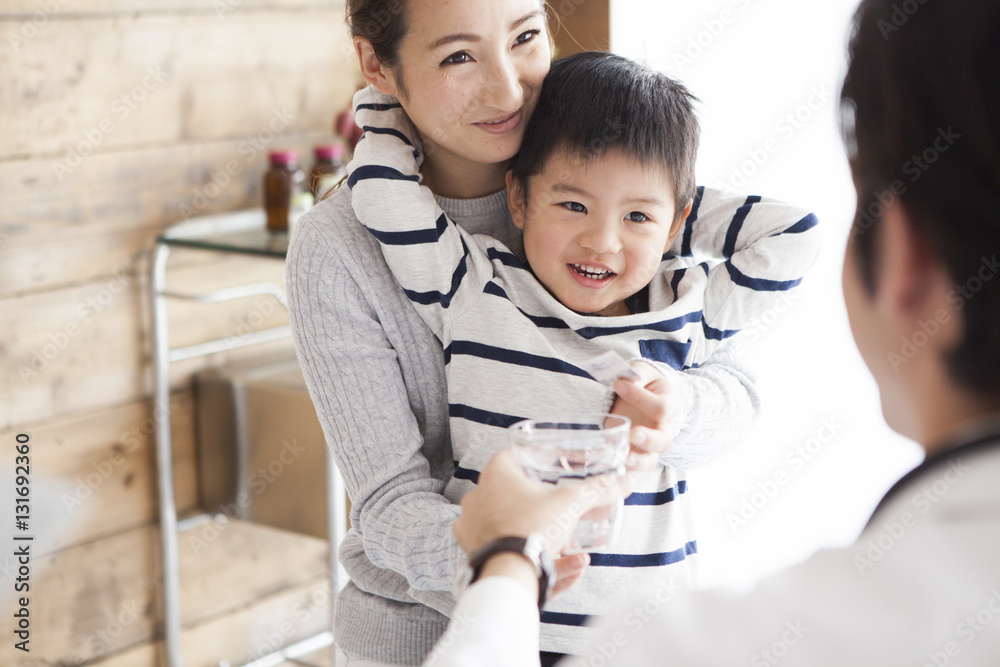 Mother and son are consulting with a clinic