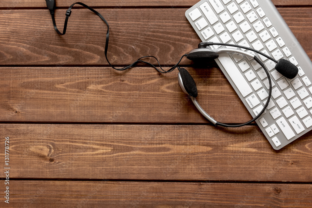 call center manager desktop top view wooden background