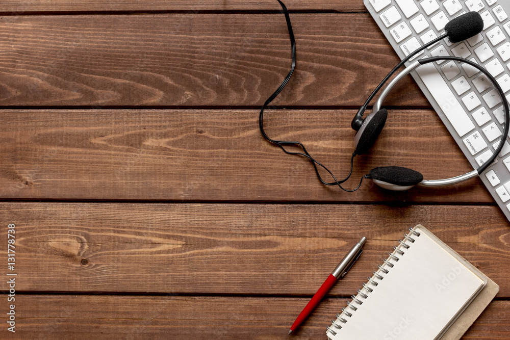 call center manager desktop top view wooden background