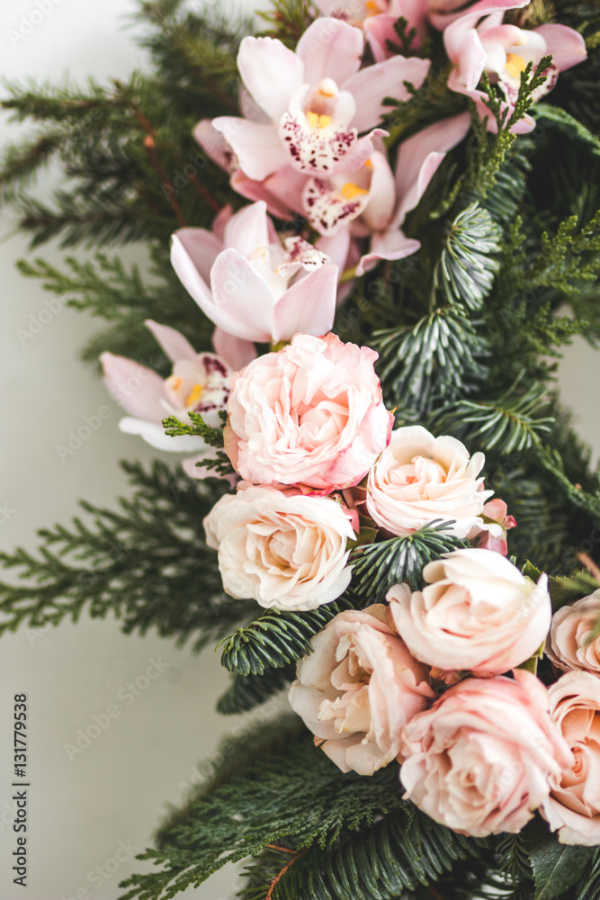 Florist makes Christmas wreath in workshop