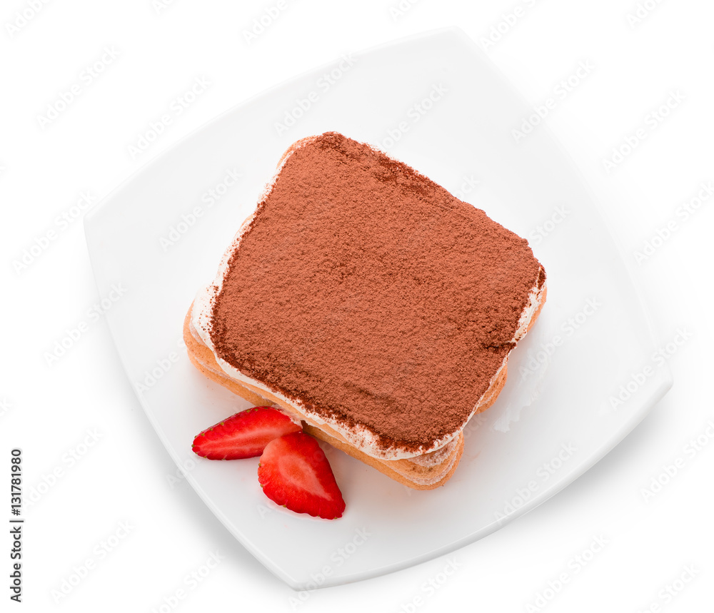 Tiramisu with strawberry on plate isolated. Top view.