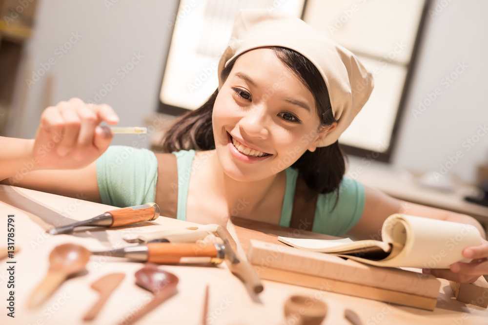 woman woodworking smile happily